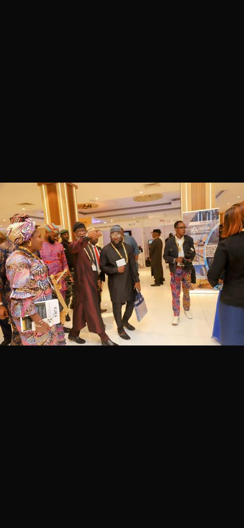 Acceptivo representatives and industry stakeholders at a Nigeria mining conference in 2024